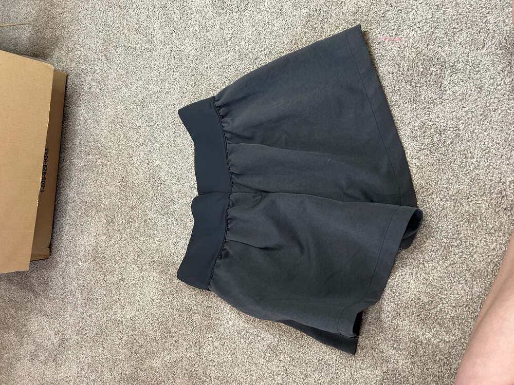 Nike Women's Tech Pack High-Waisted Woven Shorts in Black - Picture 7 of 7